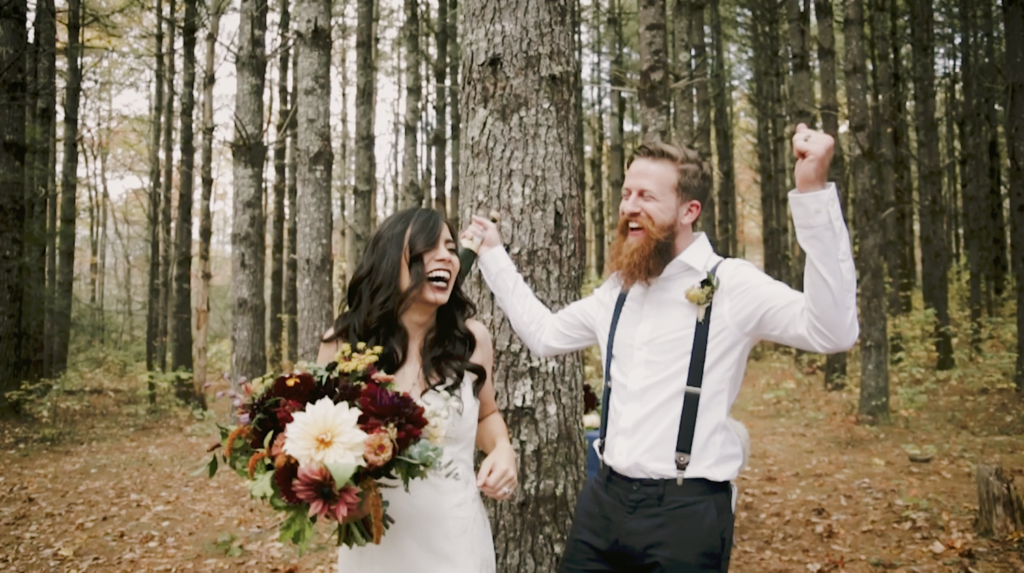 Melissa and josh celebrate and cheer during their elopement day, one of the many reasons to elope being that they provide you with pure freedom to do what you want.
