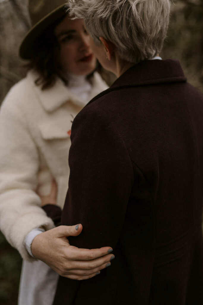 A closeup portrait of a couple embracing after Asheville elopement.