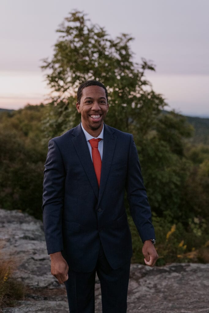 Groom in a Suit and Tie among the Blue Ridge Mountains | North Carolina Adventure Elopement